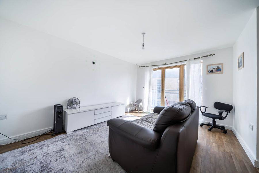 Lounge with doors to the private balcony